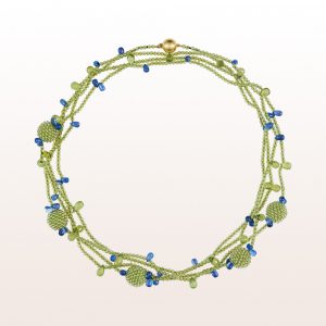 Necklace with peridote coccinella spheres and beads, kyanite and an 18kt yellow gold clasp
