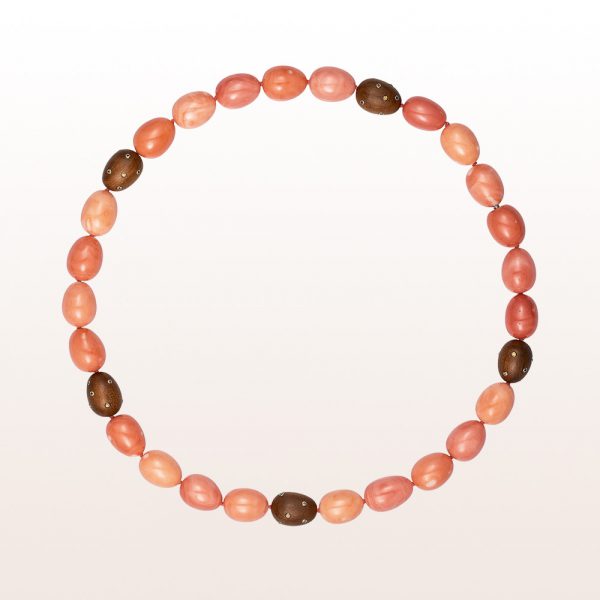 Necklace with coral and rose wood eggs with spessartin in 18kt white gold