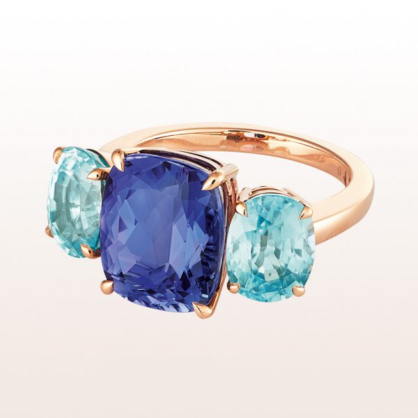 Ring with tanzanite 6,50ct and blue zircones 6,41ct in 18kt rose gold