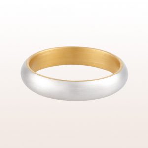Wedding ring out of platin and fine gold. With 4mm to 7mm