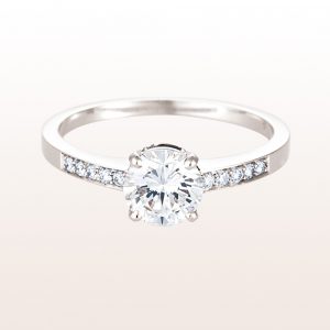 Ring with one brilliant 1,00ct and brilliants 0,09ct in 18kt white gold